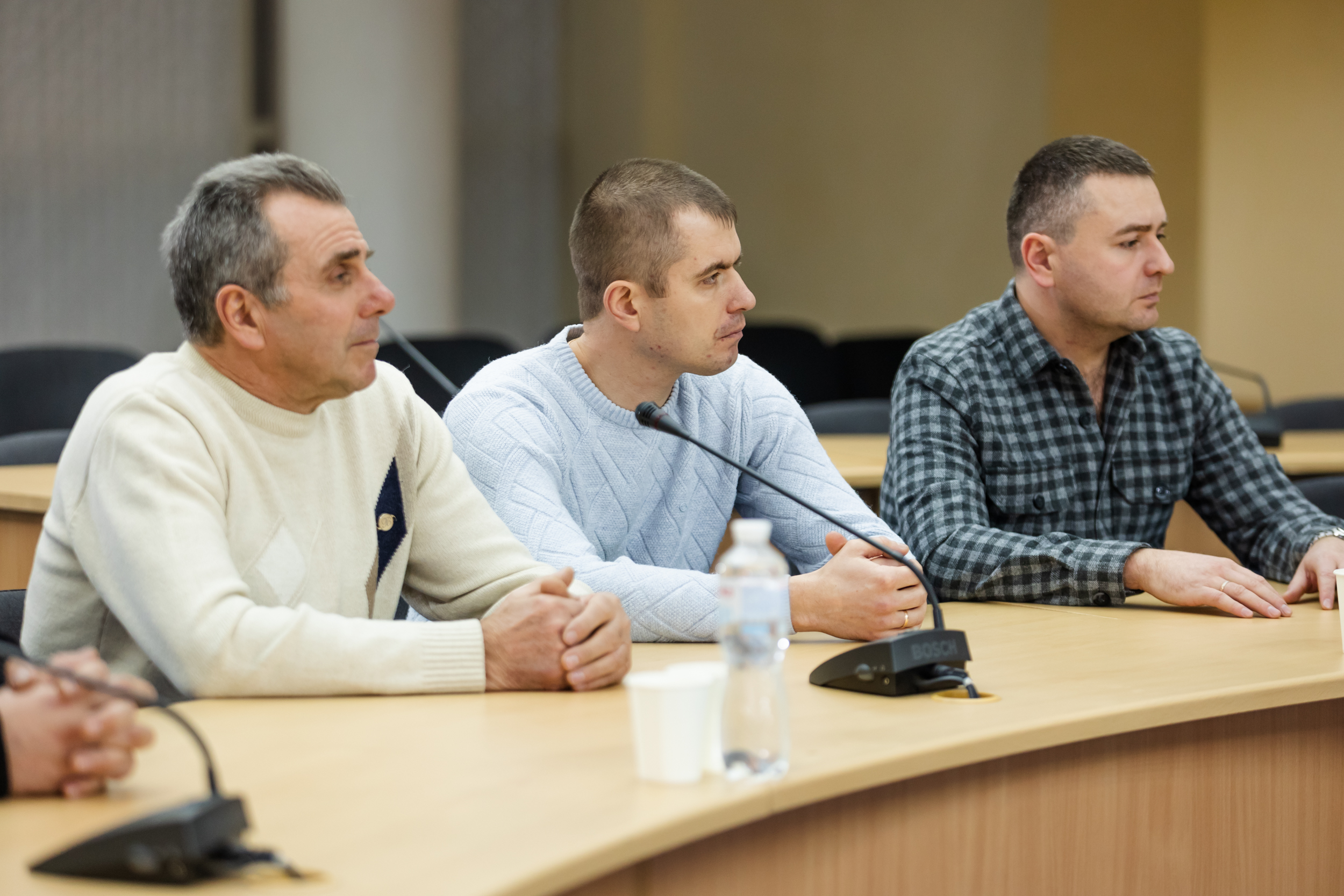 Троє фахівців, який відзначили з нагоди професійного свята
