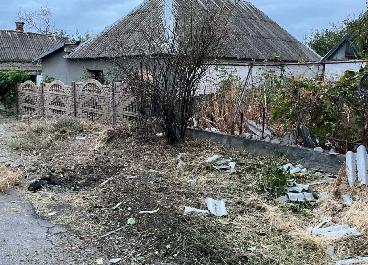 Потрощений паркан